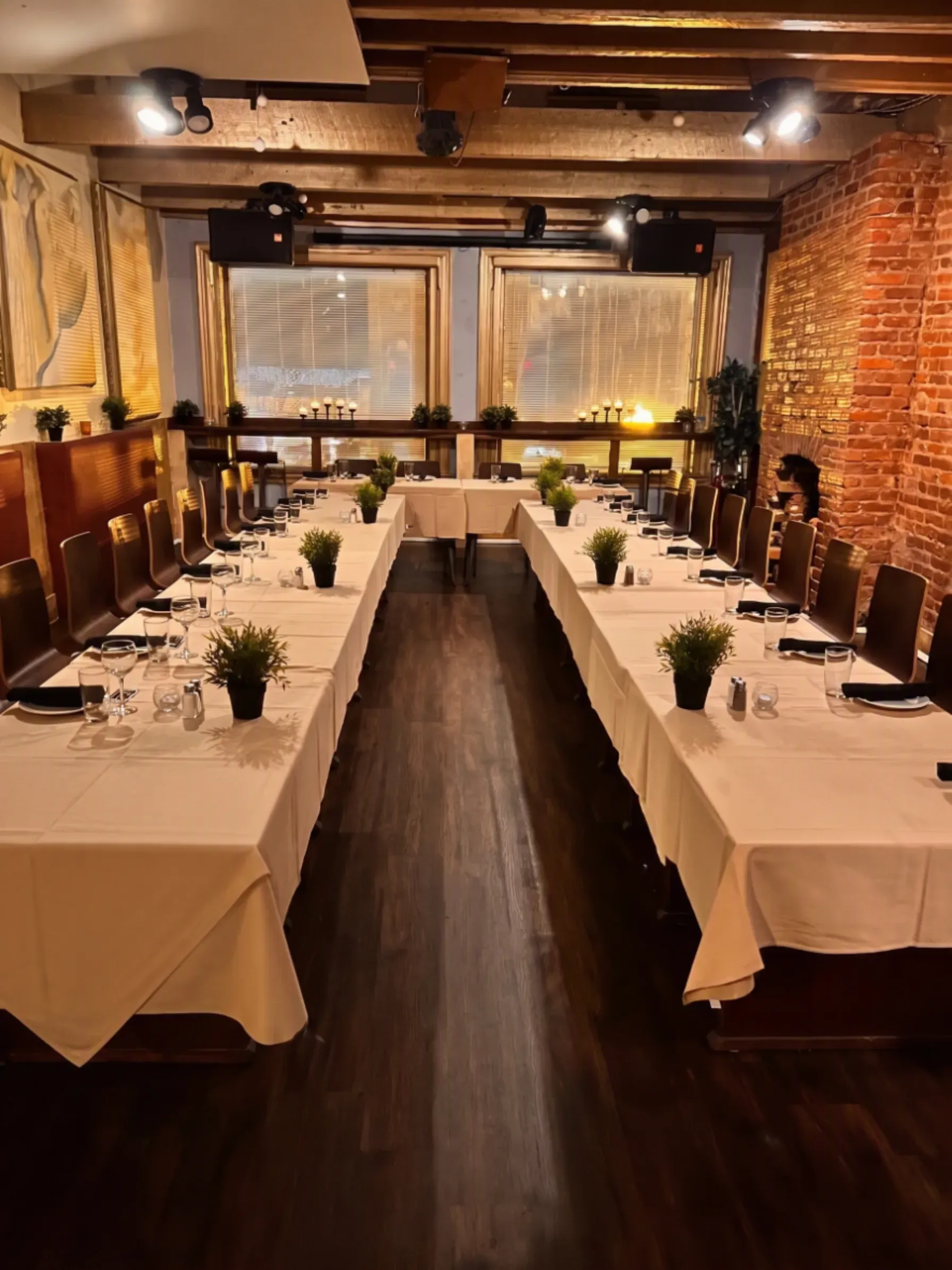 Private dinner set with candles and meze plates